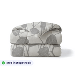 Zelesta Pure Design Cotton Duvet in Spring Buds folded on a white background, with a badge highlighting the integrated tuck-in flap feature