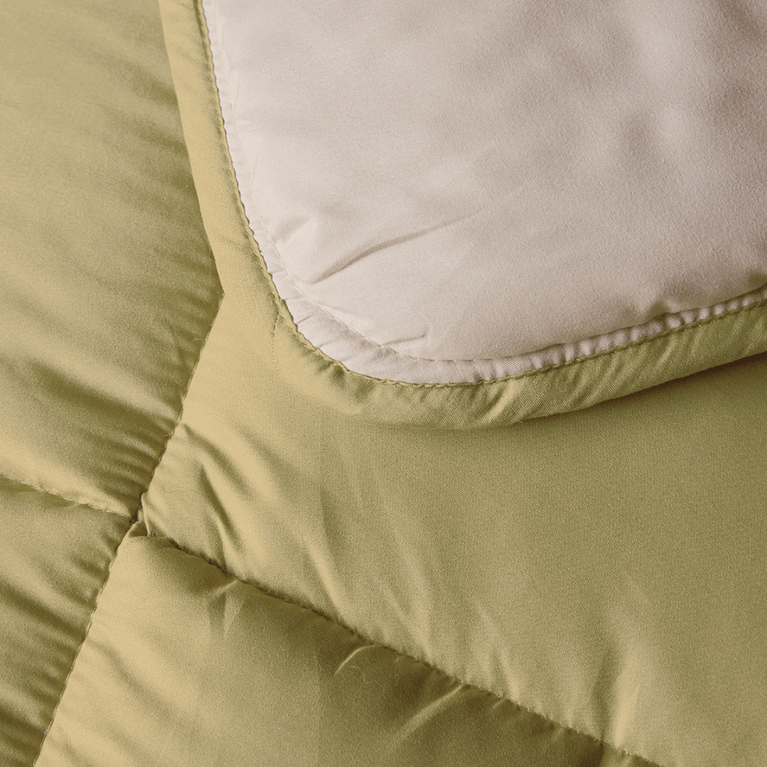 Zelesta Comfort Kids Duvet - Cream & Olive Green, neatly folded product shot showing the cream & olive green children's print