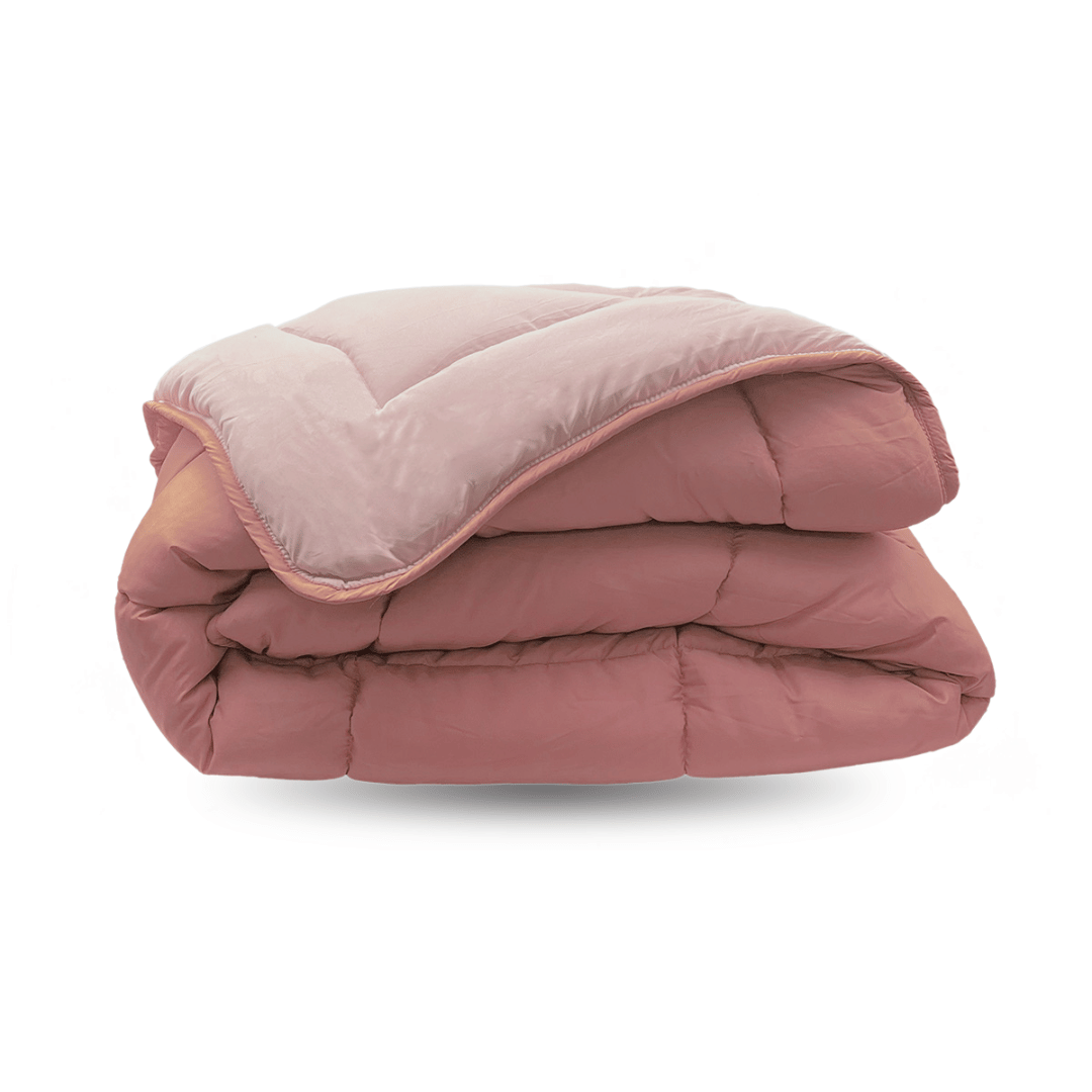Zelesta Comfort Kids Duvet - Peach Pink & Dusty Pink, neatly folded product shot showing the peach pink & dusty pink children's print