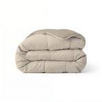 Zelesta Comfort Duo Duvet in Taupe & Champagne, neatly folded on a white background showing both colour sides