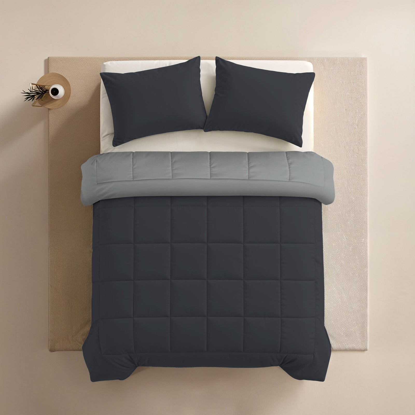 Zelesta Comfort Duo Duvet - Soft Black & Silver Grey, overhead top-down view on a made bed with matching pillows