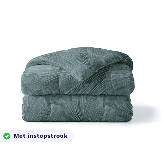Zelesta Pure Design Cotton Duvet in Botanical Green folded on a white background, with a badge highlighting the integrated tuck-in flap feature