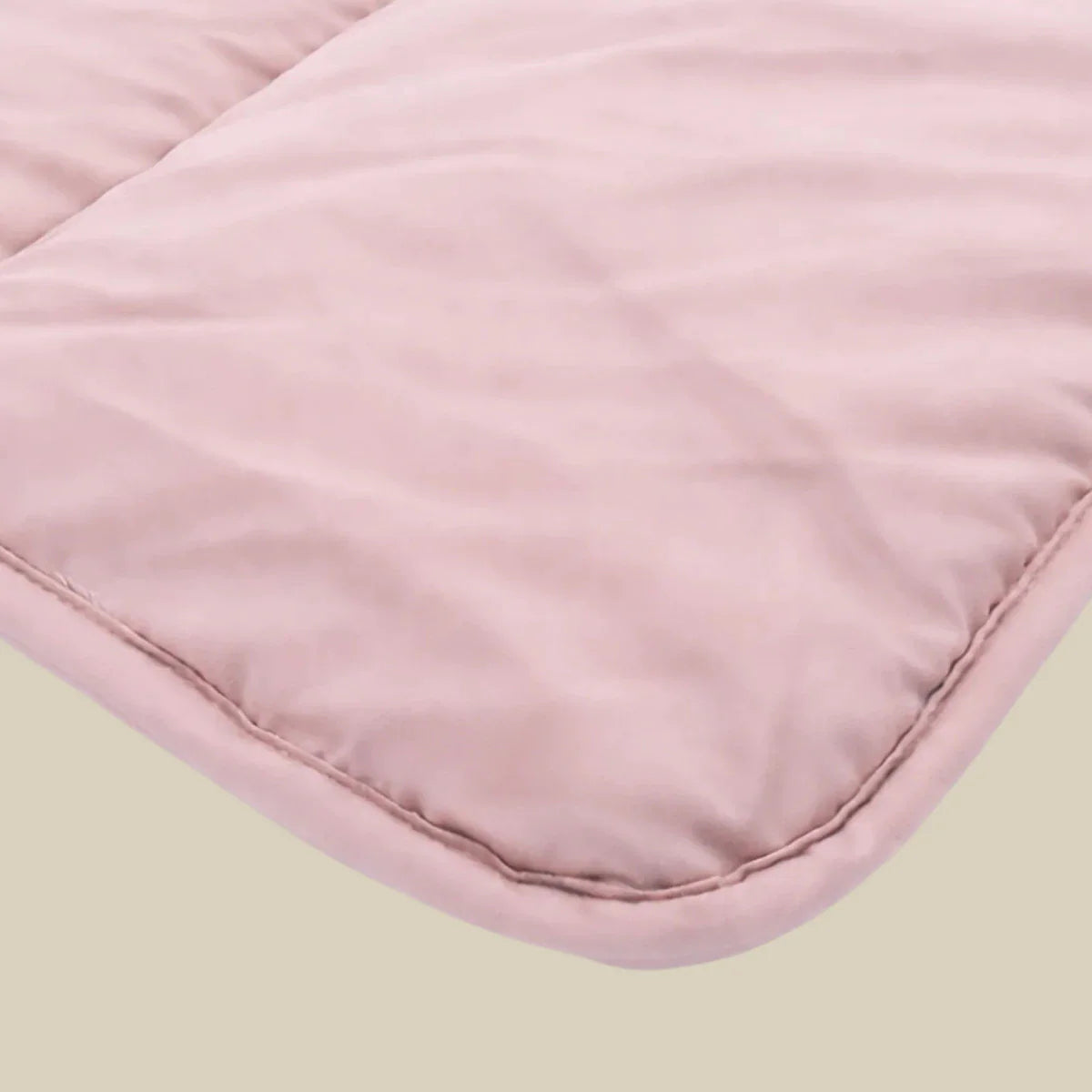 Zelesta Comfort Uni Duvet in Dusty Pink, neatly folded on a white background showing the soft dusty pink microfiber fabric