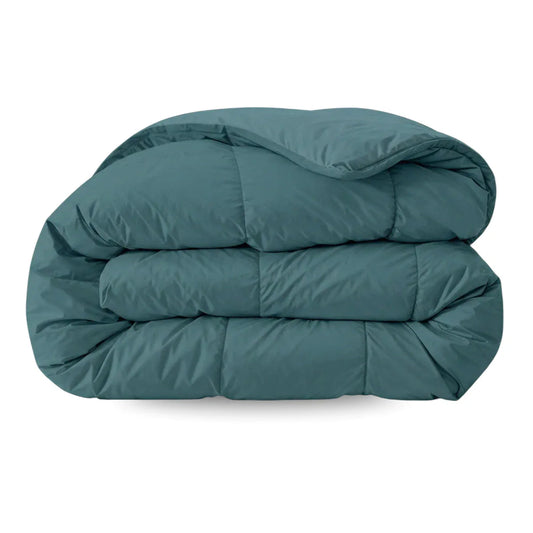 Zelesta Comfort Uni Duvet in Sea Green, neatly folded on a white background showing the soft sea green microfiber fabric