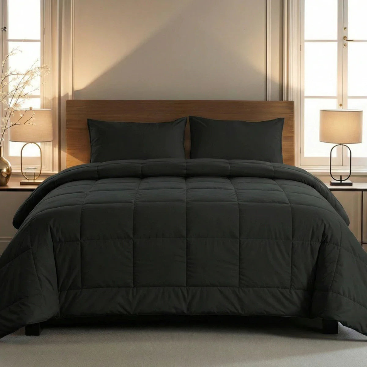 Zelesta Comfort Uni Summer Duvet in Black on a neatly made bed in a bright, modern bedroom