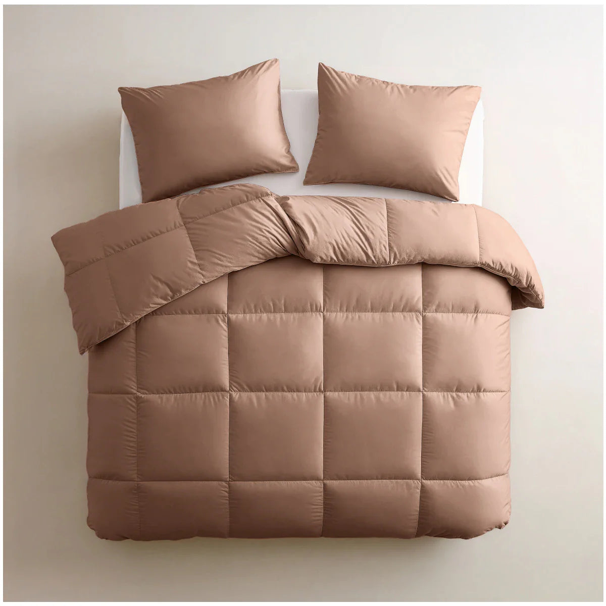 Angled lifestyle bedroom shot with the Zelesta Deluxe Uni Satin Cotton Summer Duvet - Earth Red