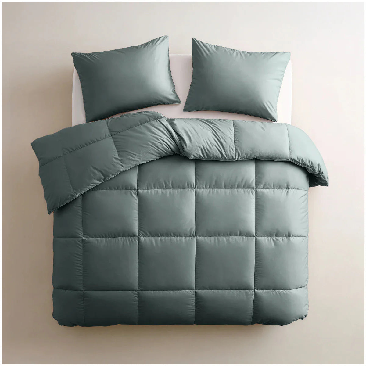 Angled lifestyle bedroom shot with the Zelesta Deluxe Uni Satin Cotton Summer Duvet - Green