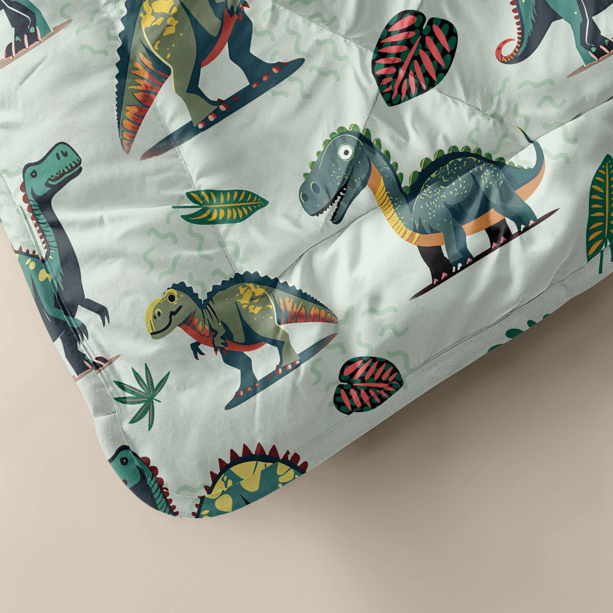 Zelesta Comfort Kids Duvet - Dino, product shot showing the fun dinosaur print in bright greens