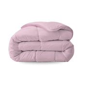Zelesta Everyday Uni Duvet in Pastel Pink, neatly folded on a white background showing the soft pastel pink microfiber fabric