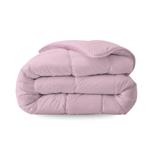 Zelesta Everyday Uni Duvet in Pastel Pink, neatly folded on a white background showing the soft pastel pink microfiber fabric