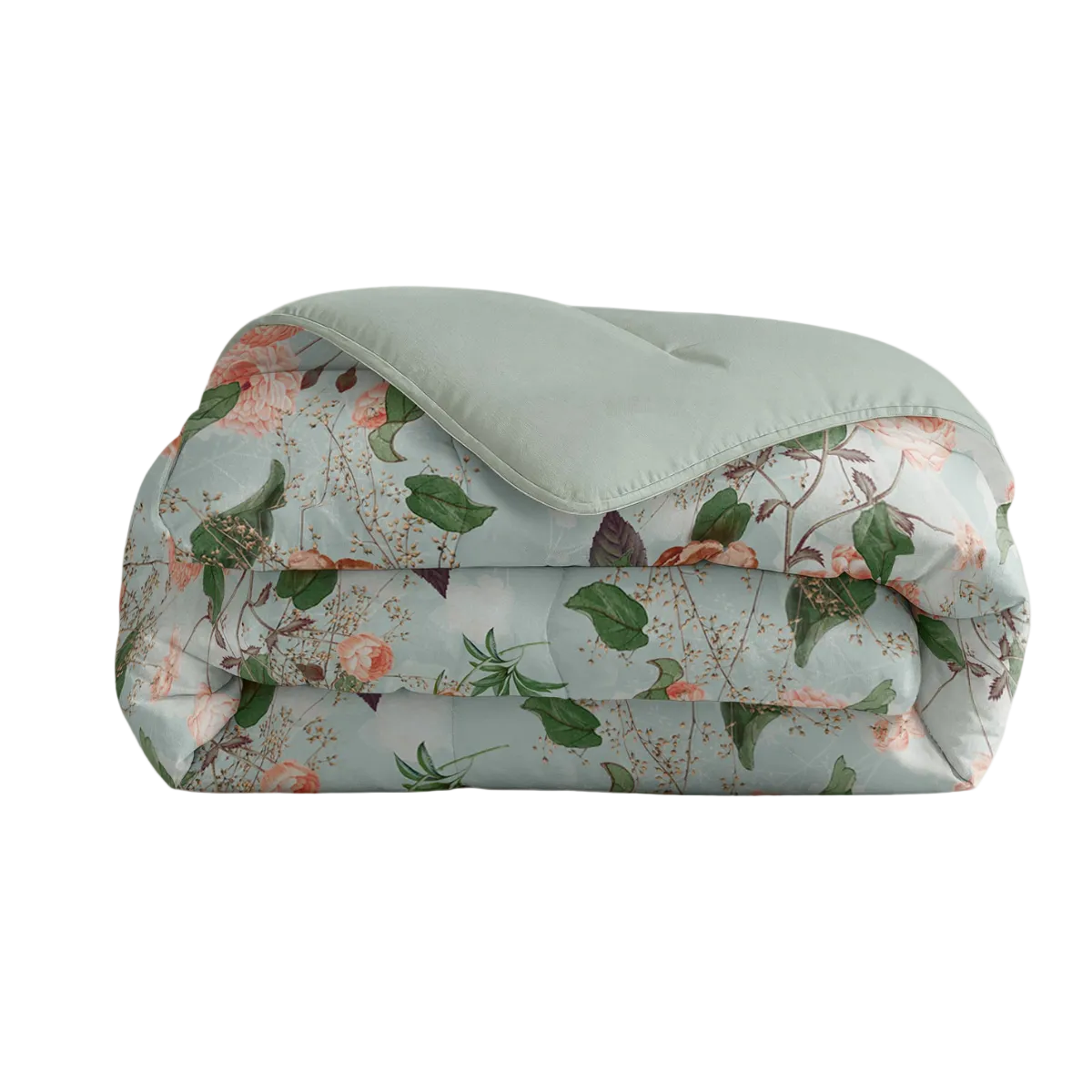 Floral patterned quilt with a green cover on a white background
