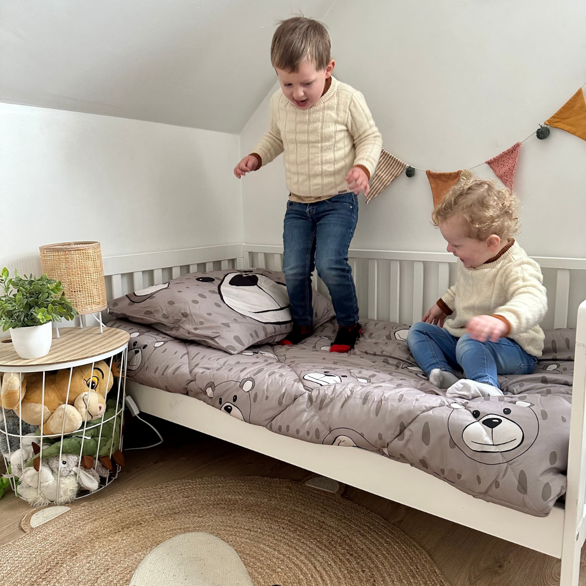 Zelesta Comfort Kids Duvet - Happy Bear, neatly folded product shot showing the cute happy bear print in warm brown tones