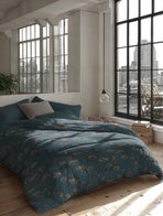 Zelesta Everyday Design Duvet - Majestic, overhead view on a neatly made bed showing the elegant majestic botanical pattern in deep purple and green tones