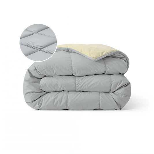 Zelesta Pure Duo Cotton Duvet in Light Grey & Butter Yellow folded on a white background with a zoomed circle showing the soft cotton fabric detail
