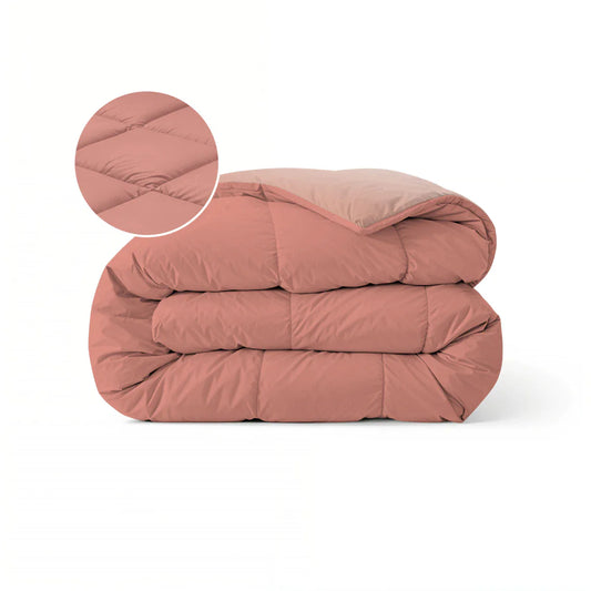 Zelesta Pure Duo Cotton Duvet in Terracotta Pink & Earth Pink folded on a white background with a zoomed circle showing the soft cotton fabric detail