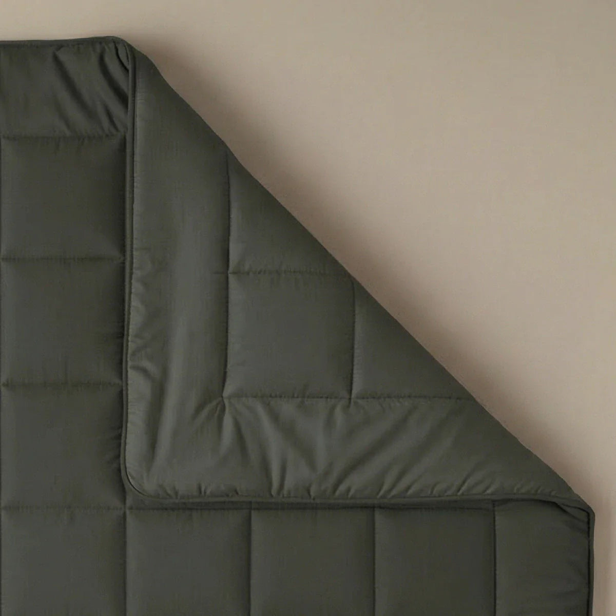 Zelesta Pure Uni Cotton Duvet in Olive Black folded on a white background, alternate angle
