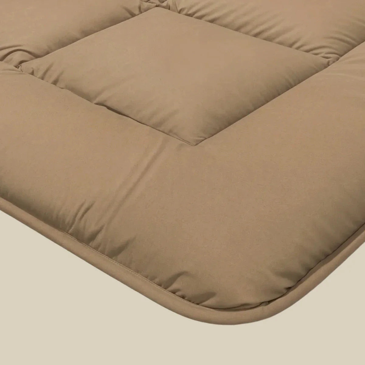 Close-up corner detail of the Zelesta Pure Uni Summer Cotton Duvet in Cocoa Brown showing the quilting and soft cotton fabric texture