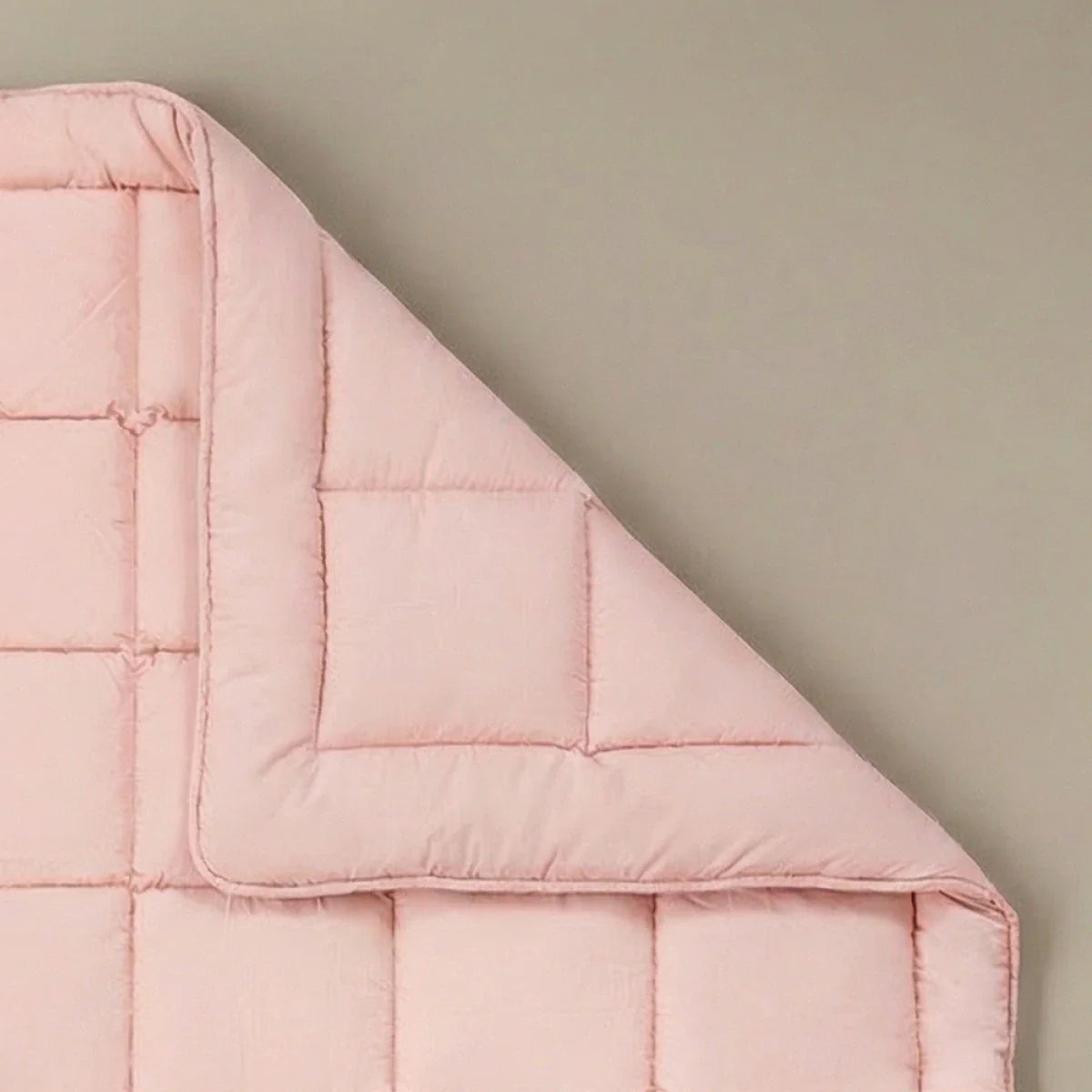 Zelesta Pure Uni Cotton Duvet in Soft Pink folded on a white background, alternate angle