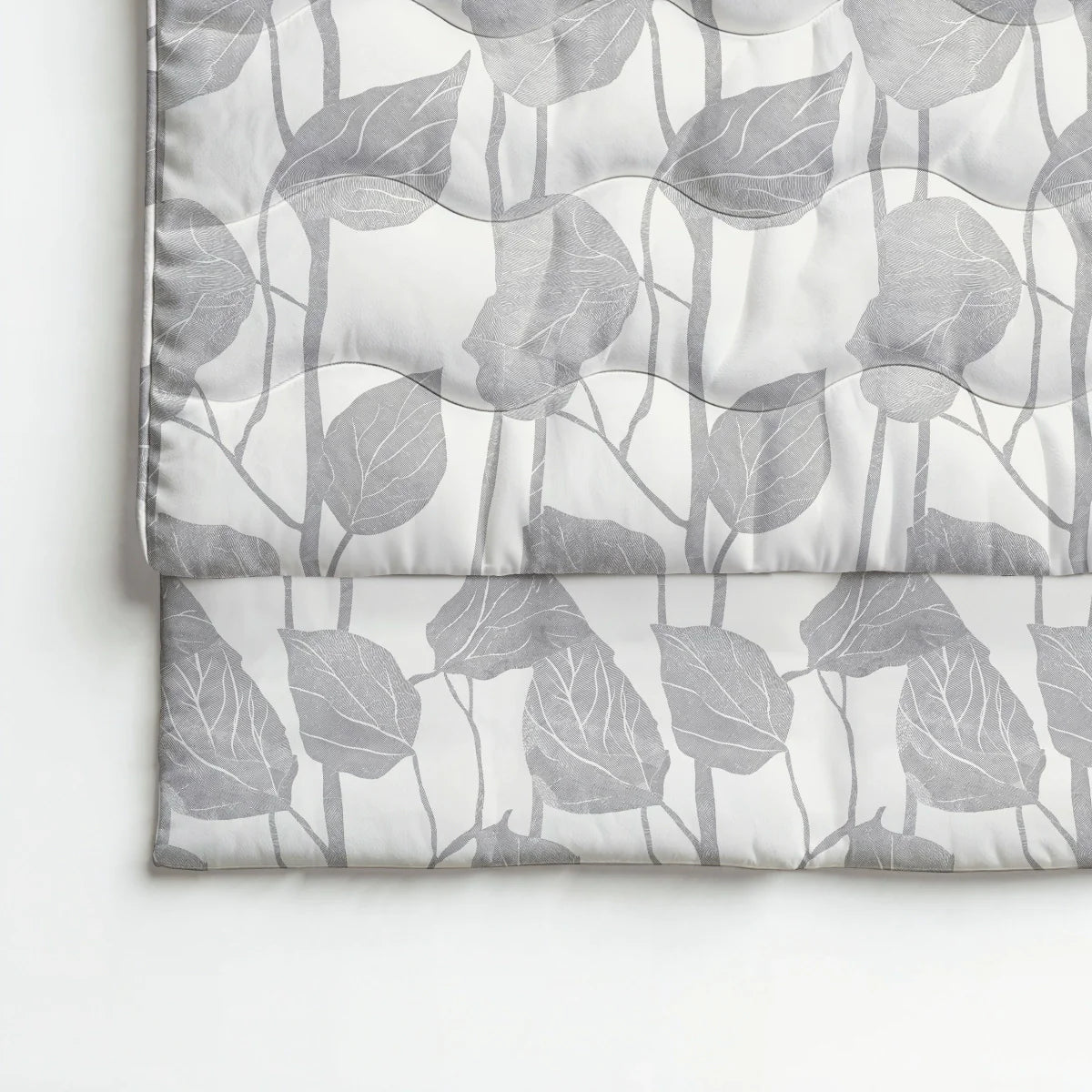 Close-up overhead view of the Zelesta Pure Design Cotton Duvet in Spring Buds fabric, showing the spring buds pattern and quilting texture