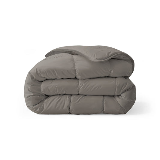 Zelesta Everyday Uni Duvet in Soft Grey, neatly folded on a white background showing the soft soft grey microfiber fabric