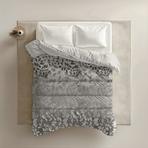 Zelesta Everyday Design Duvet - Silver Wilderness, overhead view on a neatly made bed showing the nature-inspired wilderness pattern with botanical motifs in silver and grey