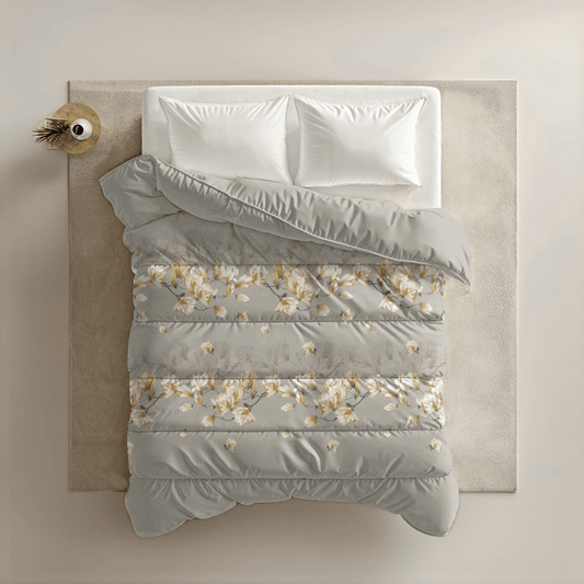 Zelesta Everyday Design Duvet - White Blossom, overhead view on a neatly made bed showing the delicate white blossom floral print on a light background