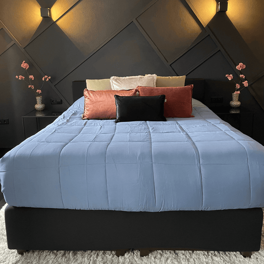 Zelesta Everyday Uni Duvet in Blue & Mastic, close-up of the folded duvet showing the smooth blue & mastic microfiber texture