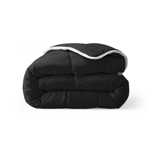 Zelesta Everyday Uni Duvet in Black, neatly folded on a white background showing the soft black microfiber fabric