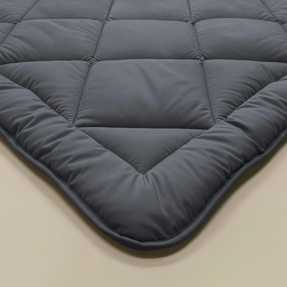 Zelesta Comfort Uni Diamond Duvet in Anthracite on a neatly made bed