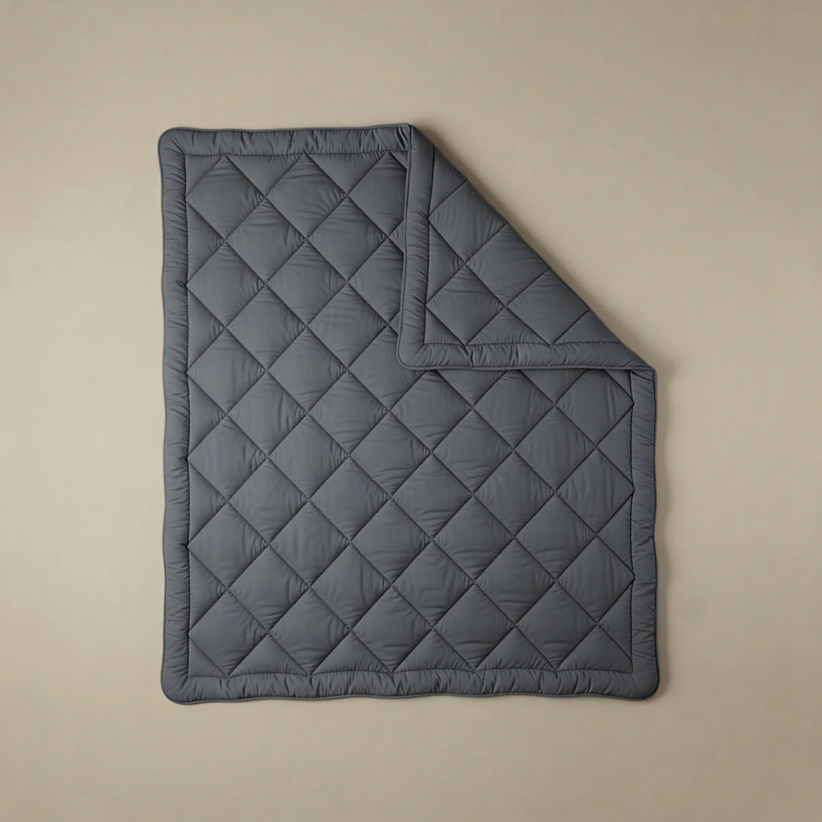 Zelesta Comfort Uni Diamond Duvet in Anthracite, neatly folded showing the diamond quilting pattern