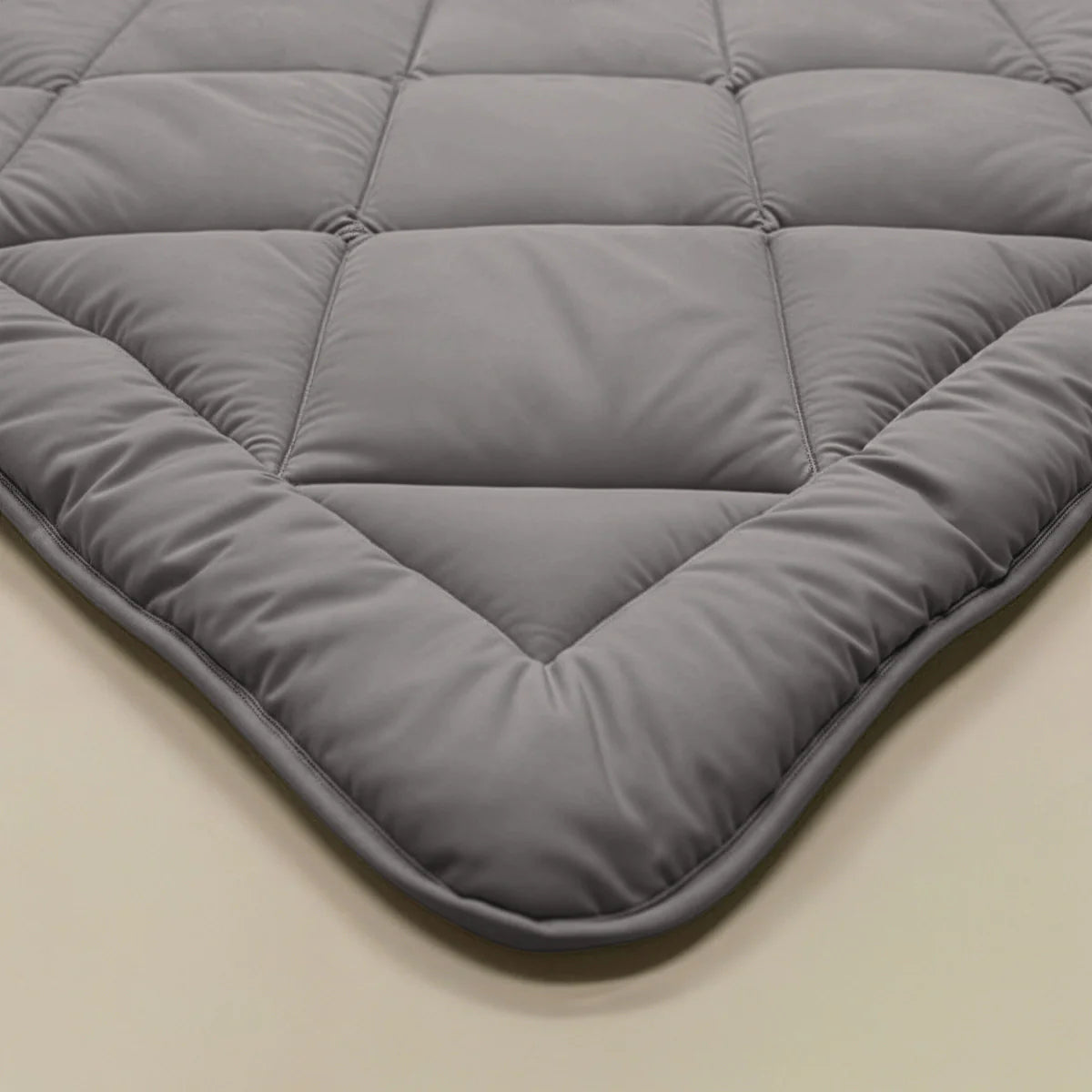 Zelesta Comfort Uni Diamond Duvet in Brown-Grey on a neatly made bed