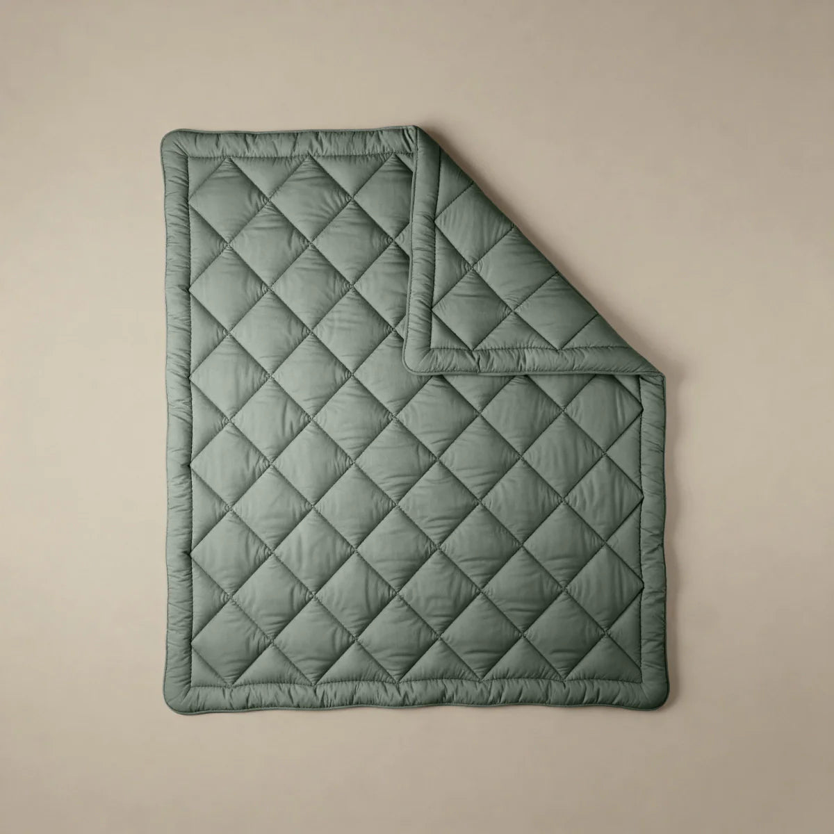 Zelesta Comfort Uni Diamond Duvet in Green, neatly folded showing the diamond quilting pattern