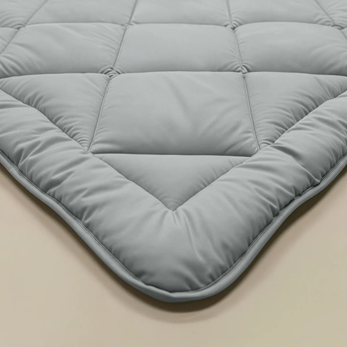 Zelesta Comfort Uni Diamond Duvet in Grey-Blue on a neatly made bed