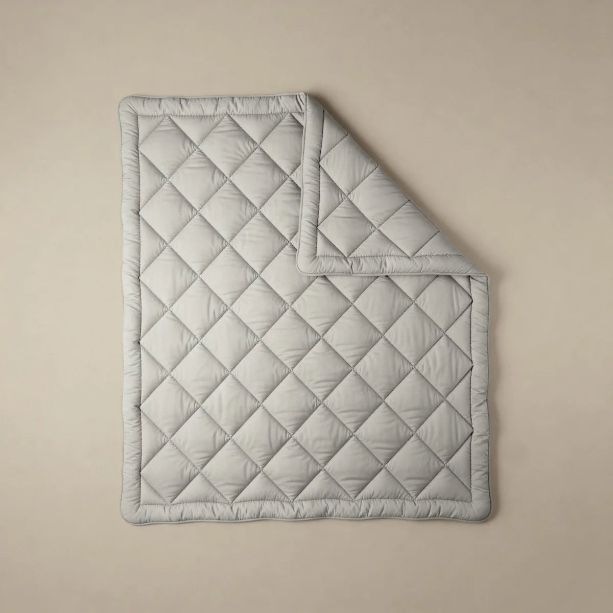 Zelesta Comfort Uni Diamond Duvet in Sand Beige, neatly folded showing the diamond quilting pattern