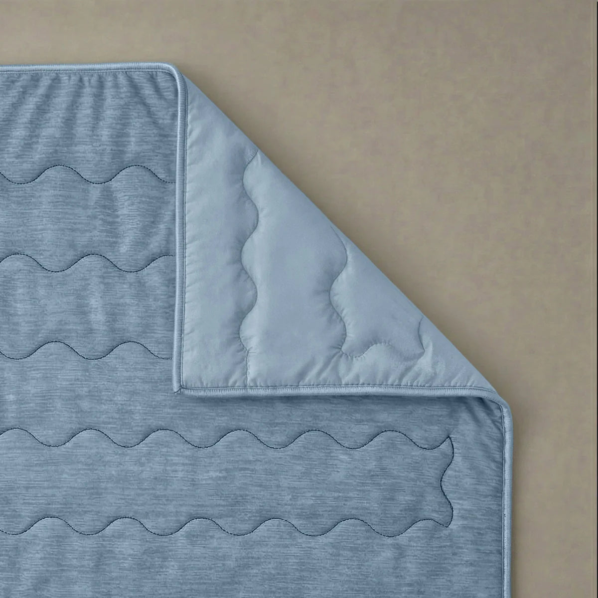 Close-up of the cooling blend fabric texture of the Zelesta Special Cooling Blend Summer Duvet in Serene Blue