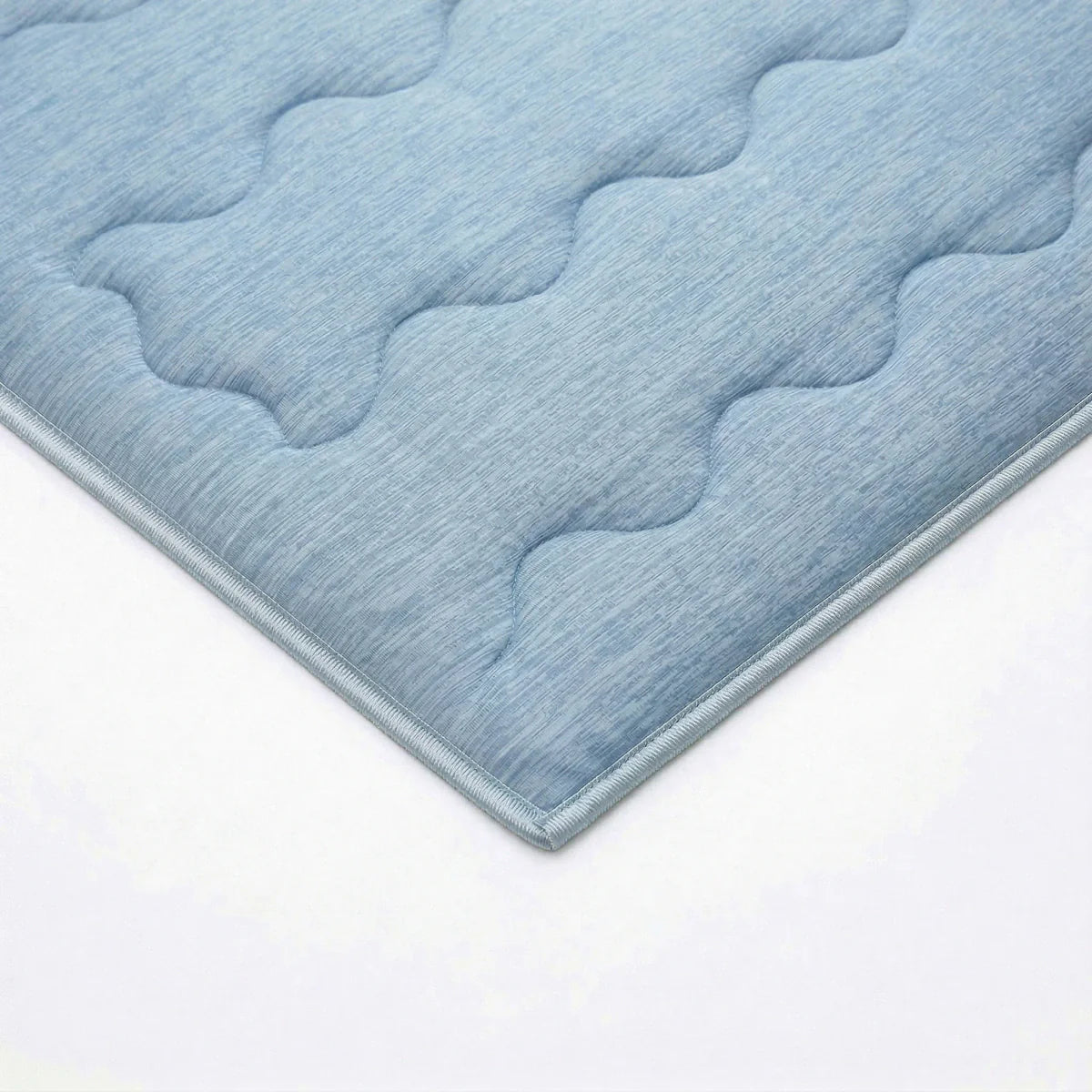 Close-up of the cooling blend fabric texture of the Zelesta Special Cooling Blend Summer Duvet in Serene Blue