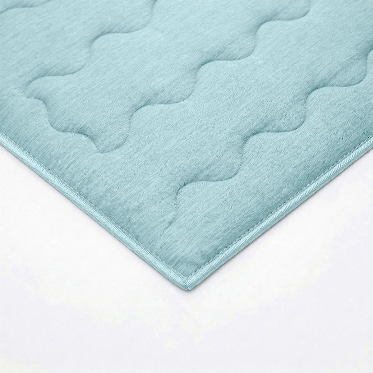Close-up of the cooling blend fabric texture of the Zelesta Special Cooling Blend Summer Duvet in Fresh Mint Green