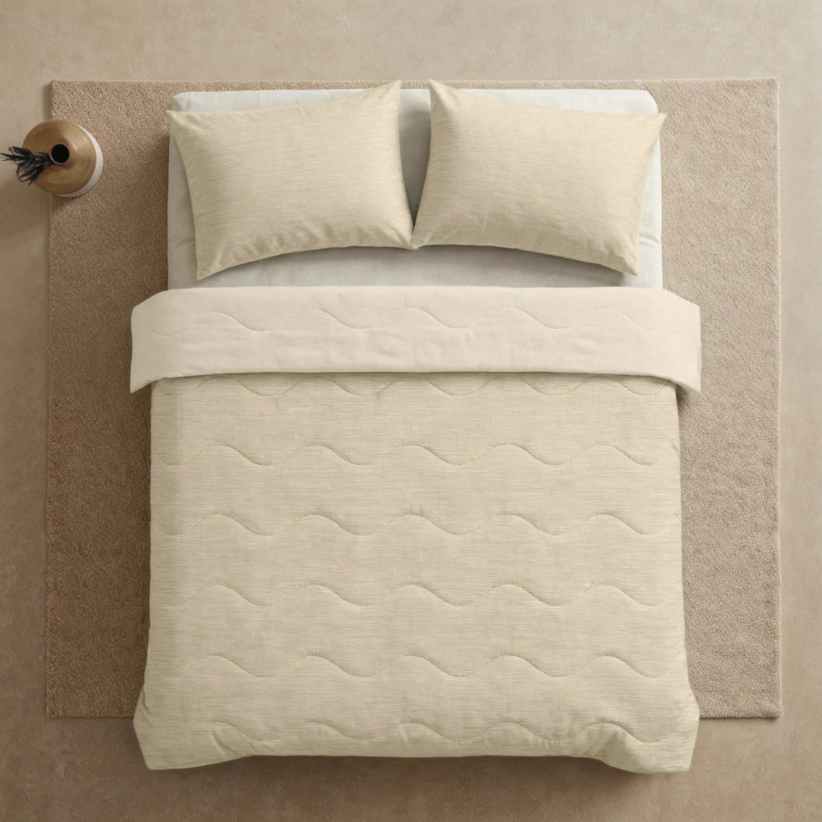 Close-up lifestyle view of the Zelesta Special Cooling Blend Summer Duvet - Ivory Sand on a styled bed