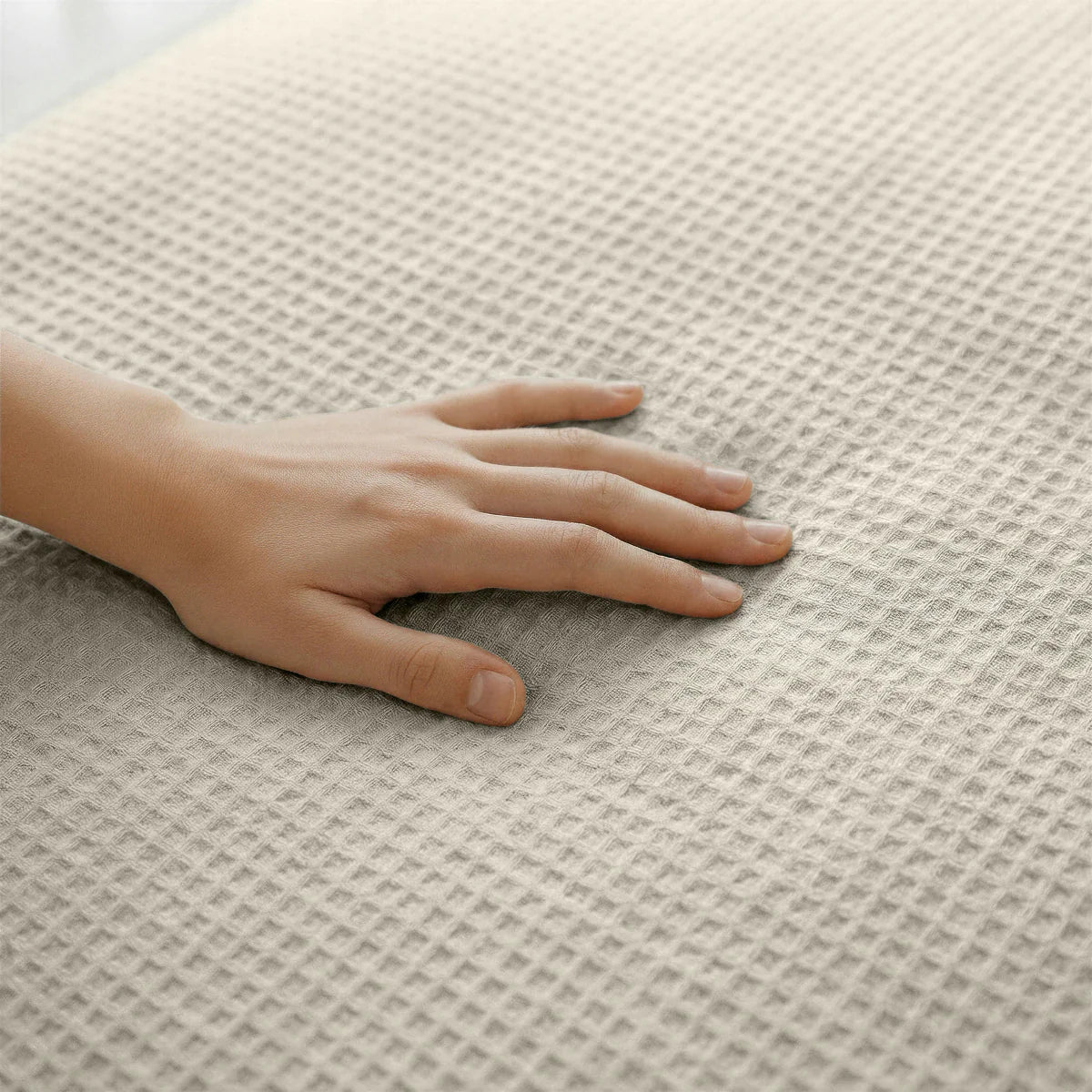 Close-up of the cooling fabric texture of the Zelesta Special Cooling Serene Summer Duvet in Cream White