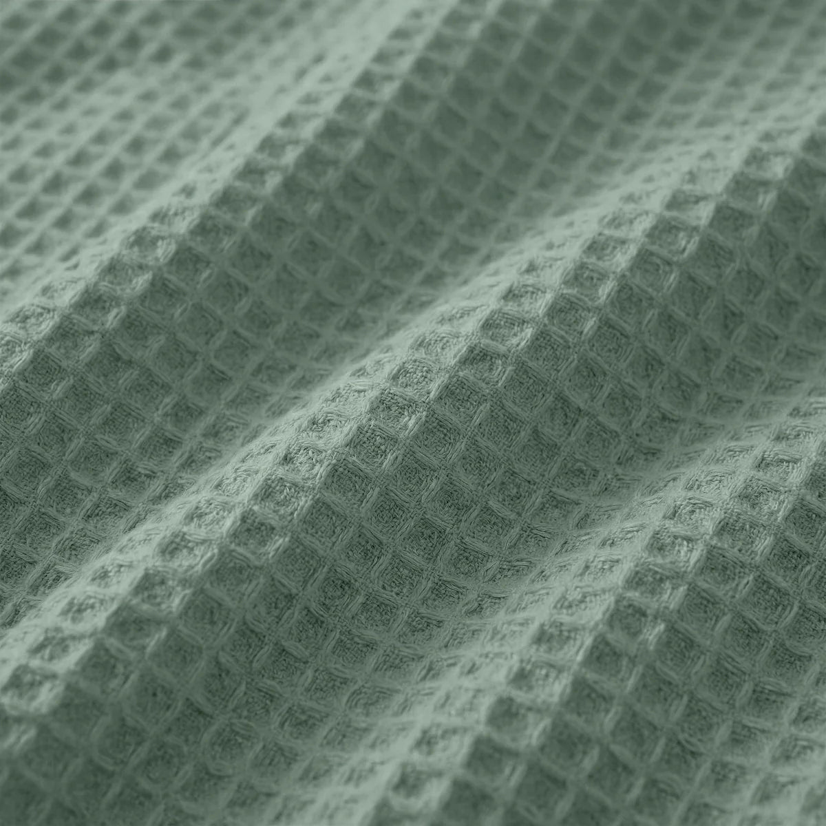 Close-up of the cooling fabric texture of the Zelesta Special Cooling Serene Summer Duvet in Sage Green