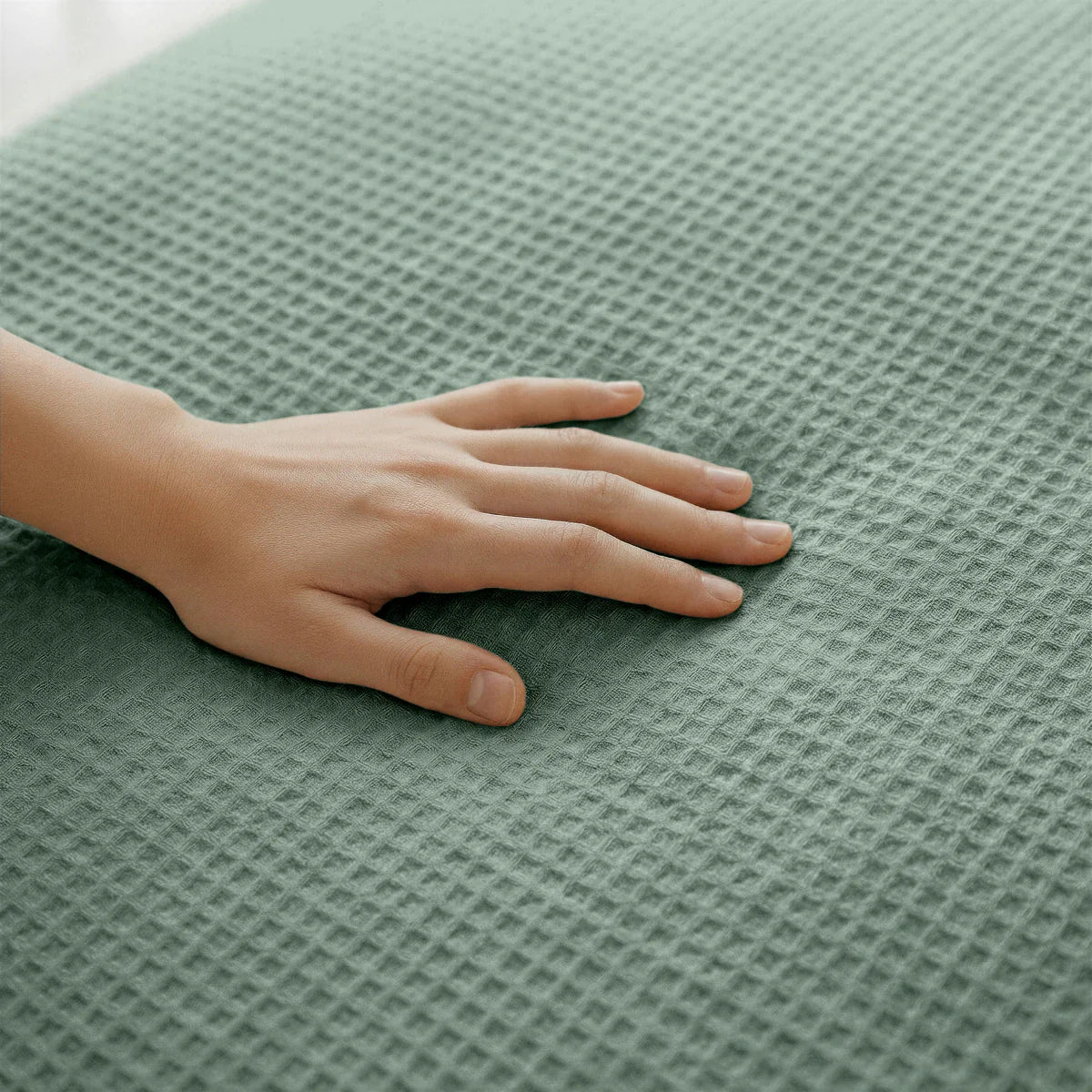 Close-up of the cooling fabric texture of the Zelesta Special Cooling Serene Summer Duvet in Sage Green