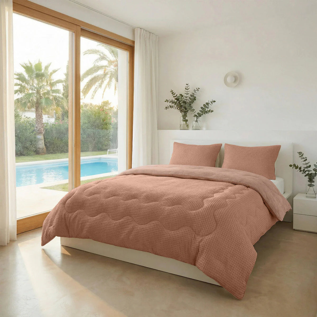 Angled lifestyle bedroom shot with the Zelesta Special Cooling Serene Summer Duvet - Terracotta Pink
