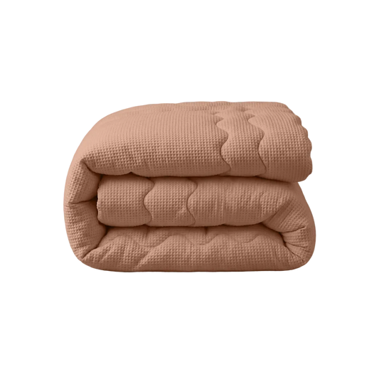 Zelesta Special Cooling Serene Summer Duvet - Terracotta Pink folded on a white background
