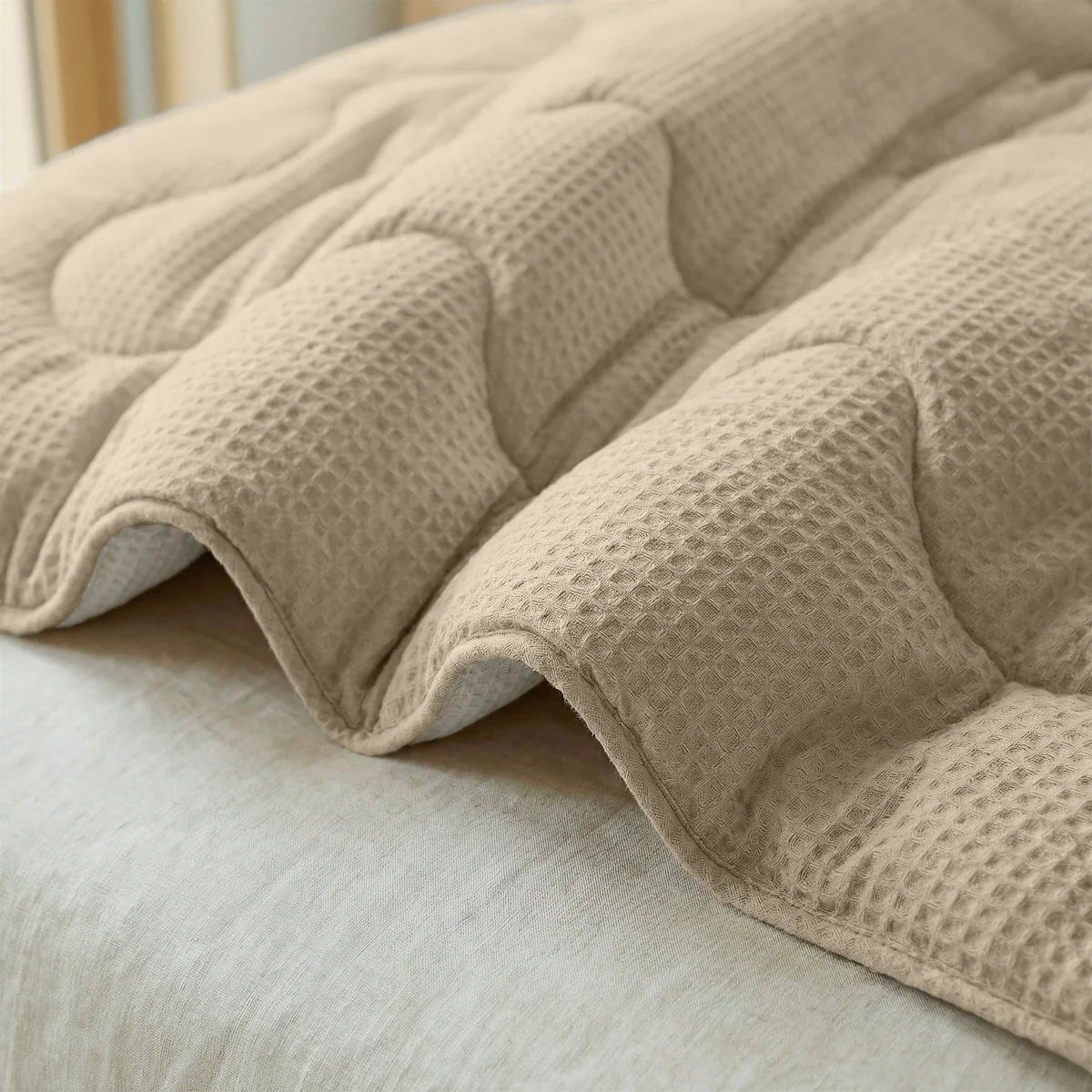 Close-up of the cooling fabric texture of the Zelesta Special Cooling Serene Summer Duvet in Sand