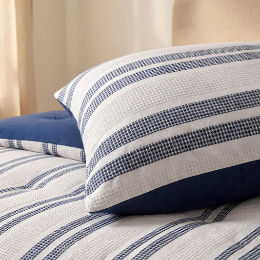 Close-up of the seersucker stripe texture of the Zelesta Special Hampton Pillowcase Set Of 2 in Blue