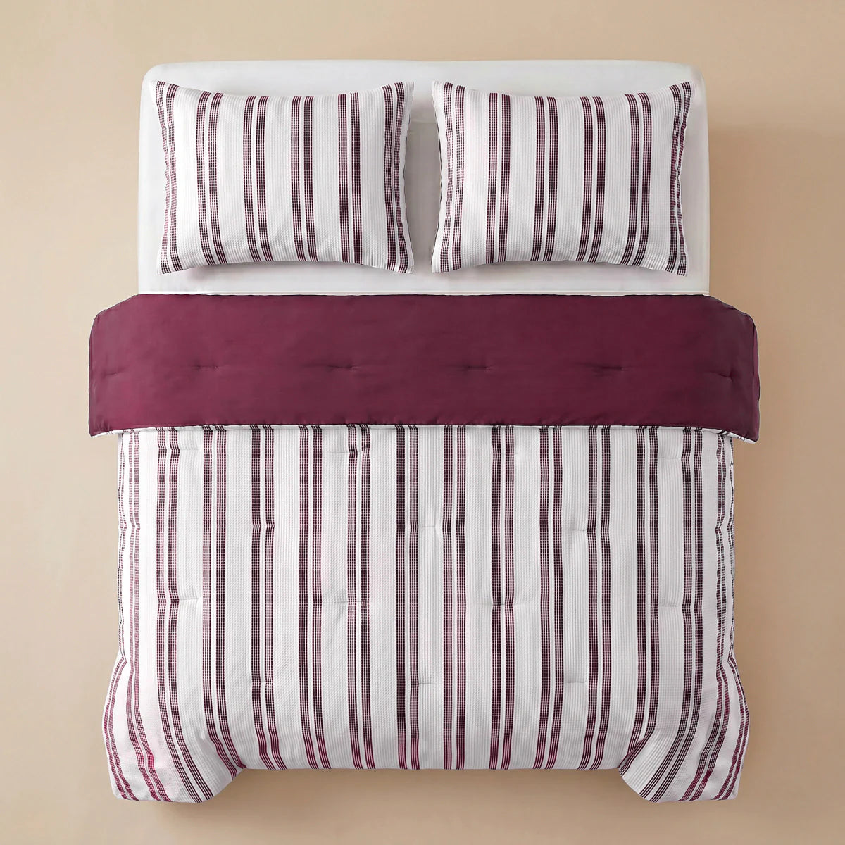Close-up lifestyle view of the Zelesta Special Hampton Summer Duvet - Burgundy on a bed in a styled bedroom