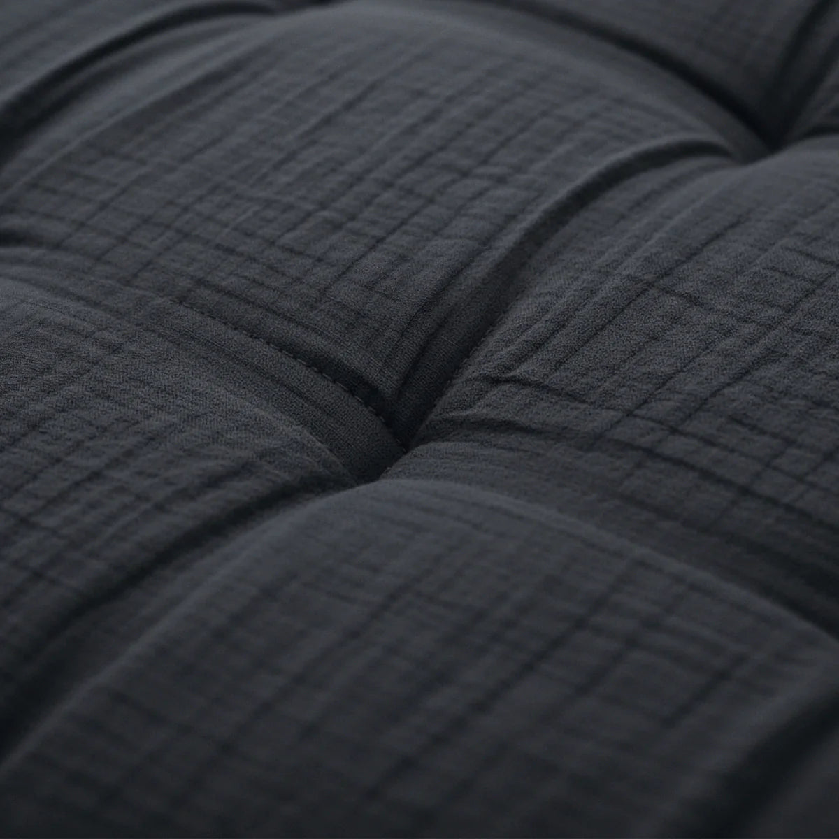 Close-up of the teddy and muslin layered fabric of the Zelesta Special Teddy Cotton Muslin Duvet in Anthracite