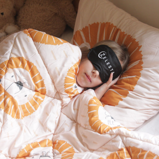 Zelesta Comfort Kids Duvet - Lucky Lion, neatly folded product shot showing the cheerful lion print in warm yellow and orange